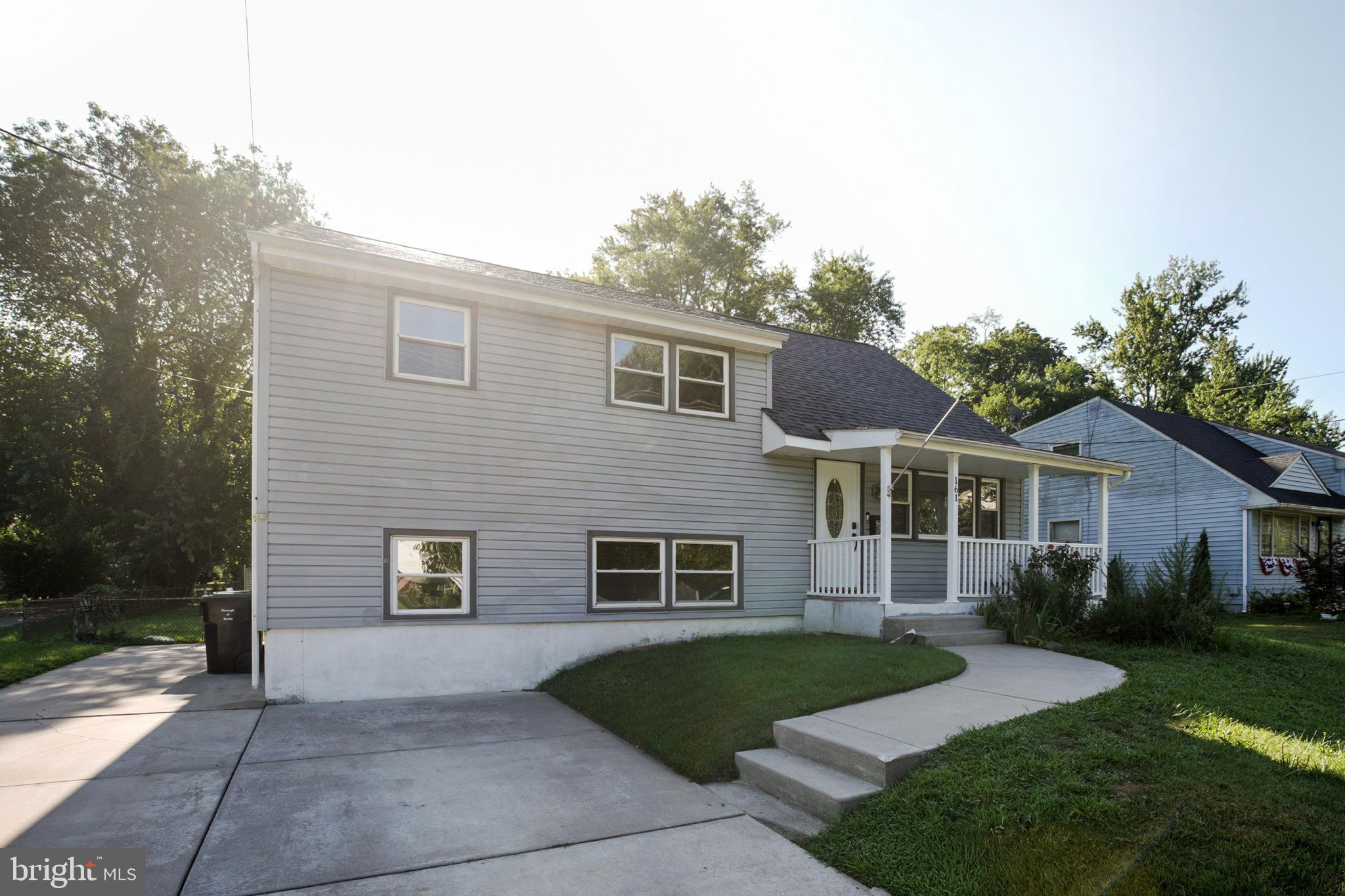 161 New Freedom Road Berlin, NJ 08009 - Photo 2 of 31 a front view of a house with a garden