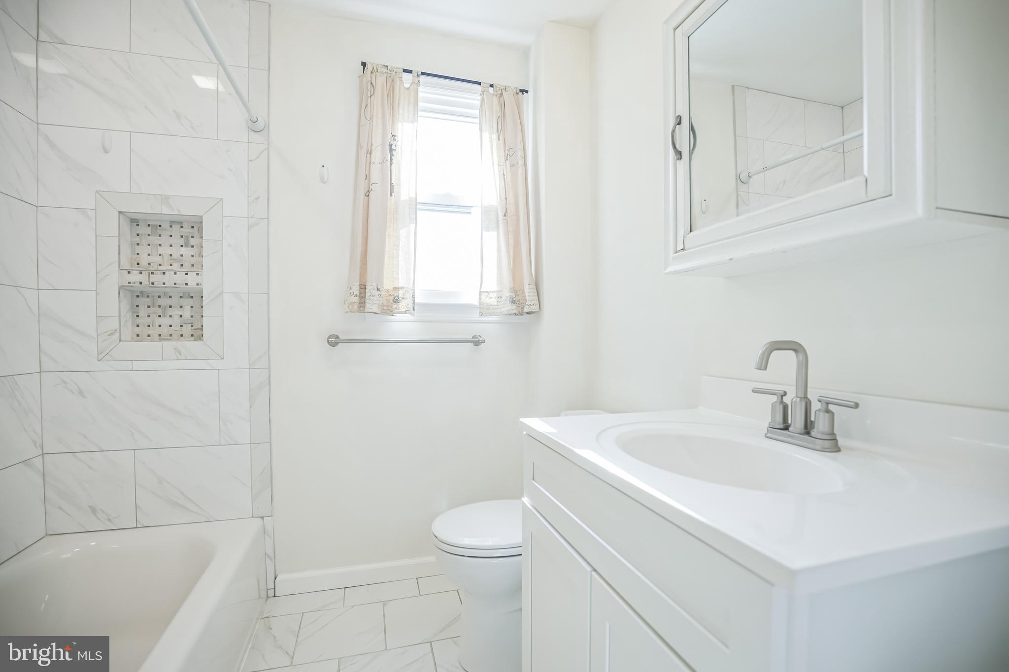 161 New Freedom Road Berlin, NJ 08009 - Photo 23 of 31 a bathroom with a sink a toilet and shower