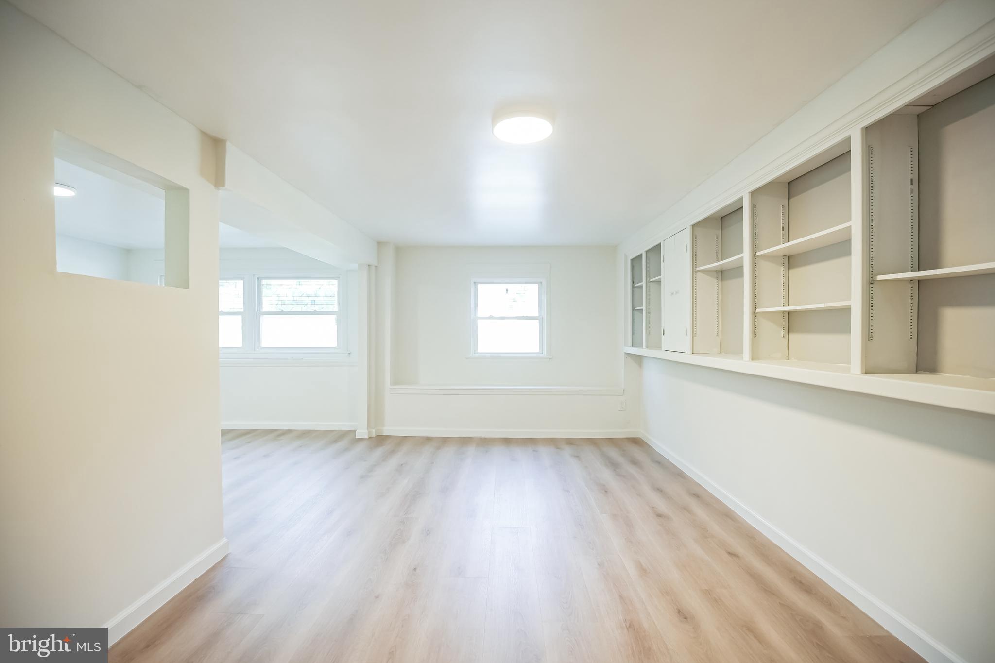 161 New Freedom Road Berlin, NJ 08009 - Photo 24 of 31 an empty room with wooden floor and windows