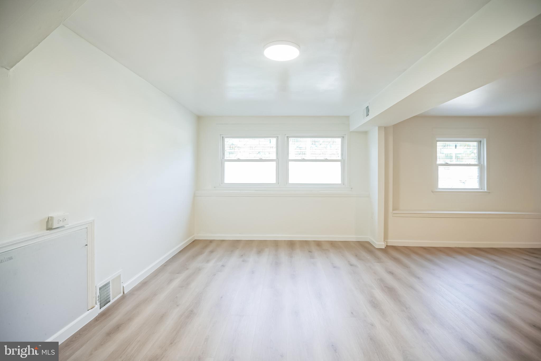 161 New Freedom Road Berlin, NJ 08009 - Photo 25 of 31 an empty room with wooden floor and windows