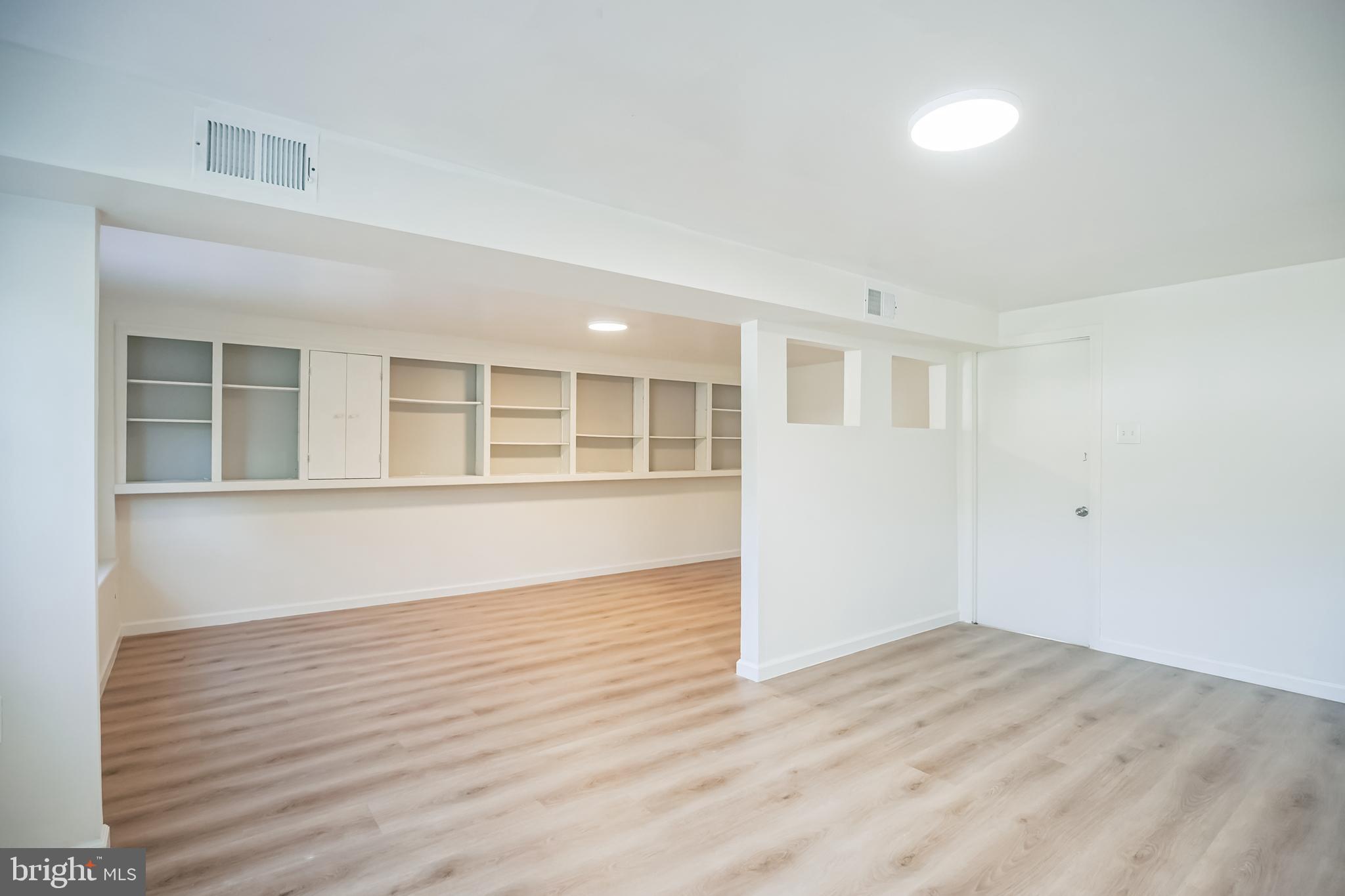 161 New Freedom Road Berlin, NJ 08009 - Photo 26 of 31 a view of an empty room with wooden floor and a window