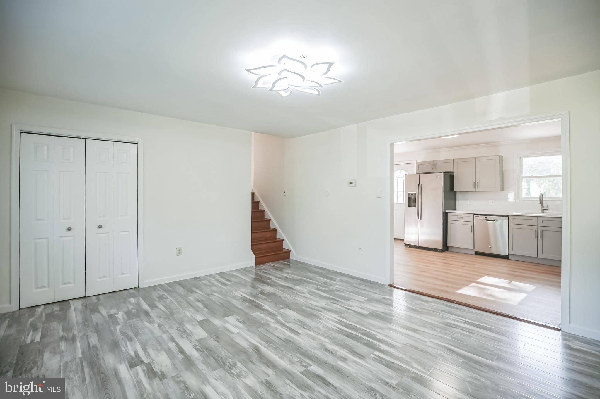 161 New Freedom Road Berlin, NJ 08009 - Photo 3 of 31 a view of a kitchen with wooden floor and a kitchen