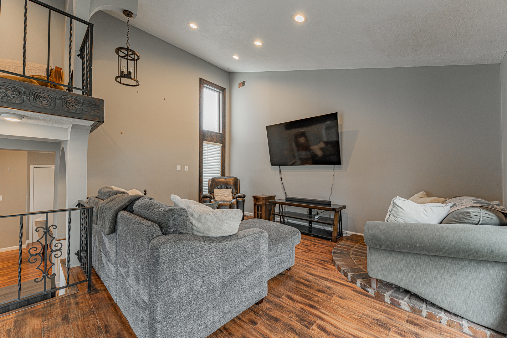 805 South Grove Street Normal, IL 61761 - Photo 15 of 32 a living room with furniture and a flat screen tv