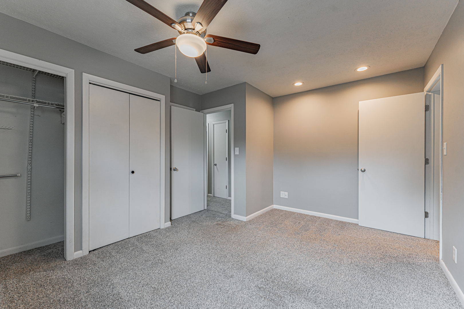 805 South Grove Street Normal, IL 61761 - Photo 22 of 32 a view of an empty room and a ceiling fan