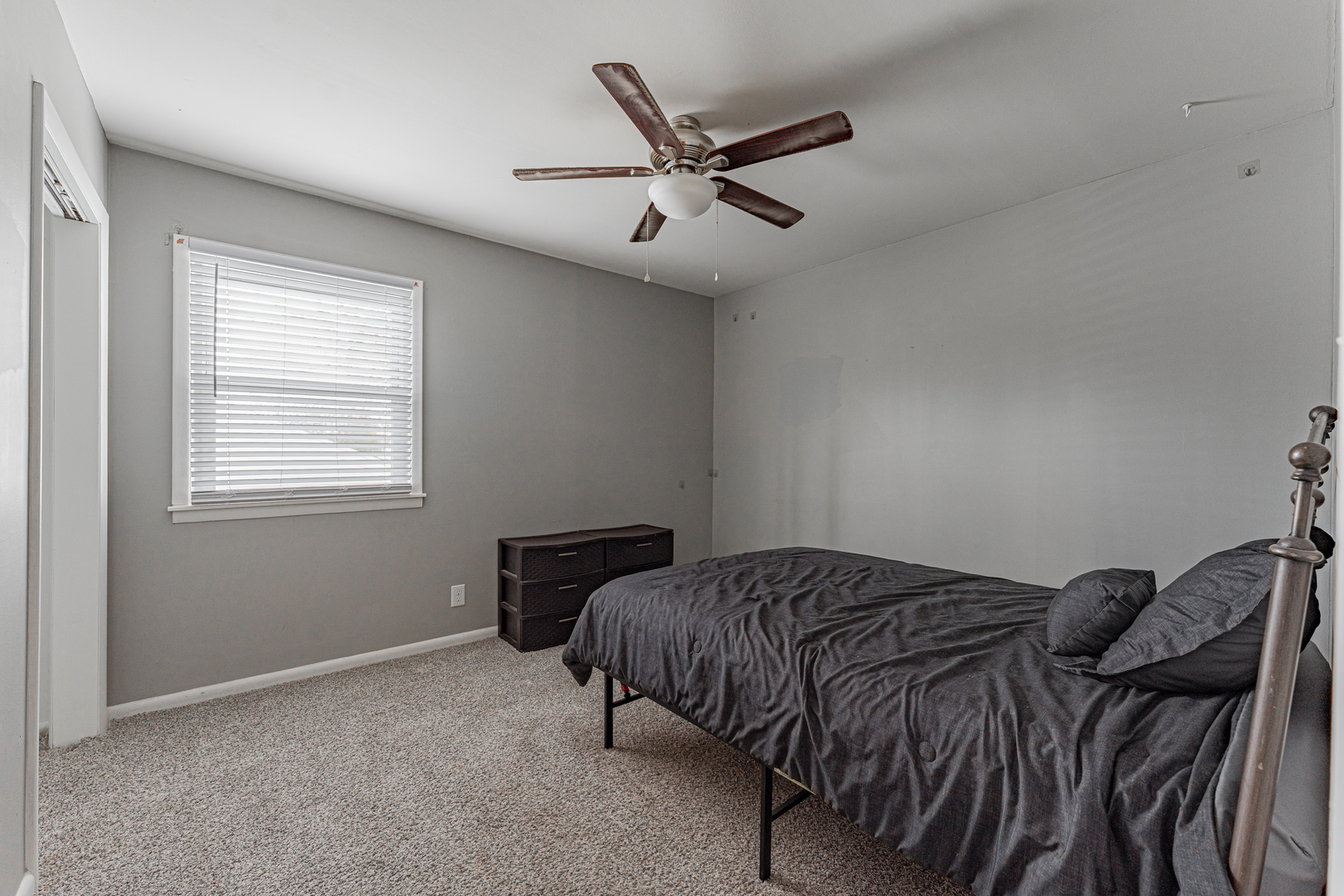 805 South Grove Street Normal, IL 61761 - Photo 24 of 32 a bedroom with a bed and window