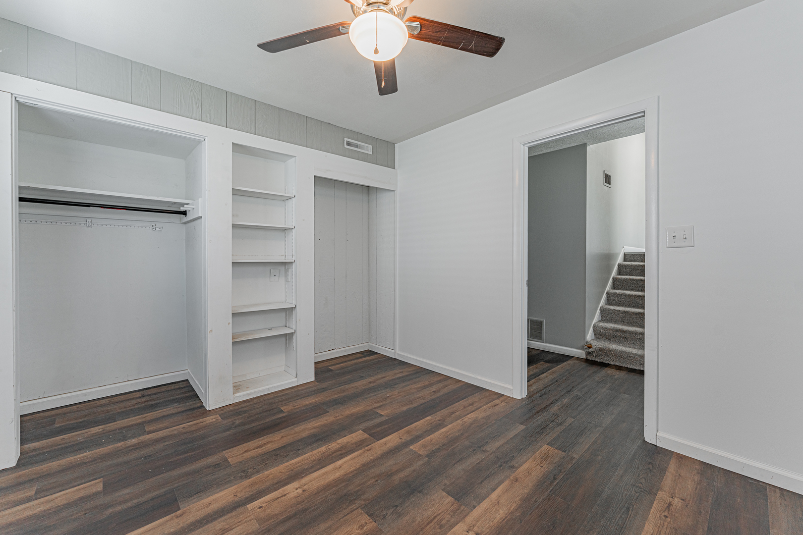 805 South Grove Street Normal, IL 61761 - Photo 6 of 32 a view of walk in closet with wooden floor