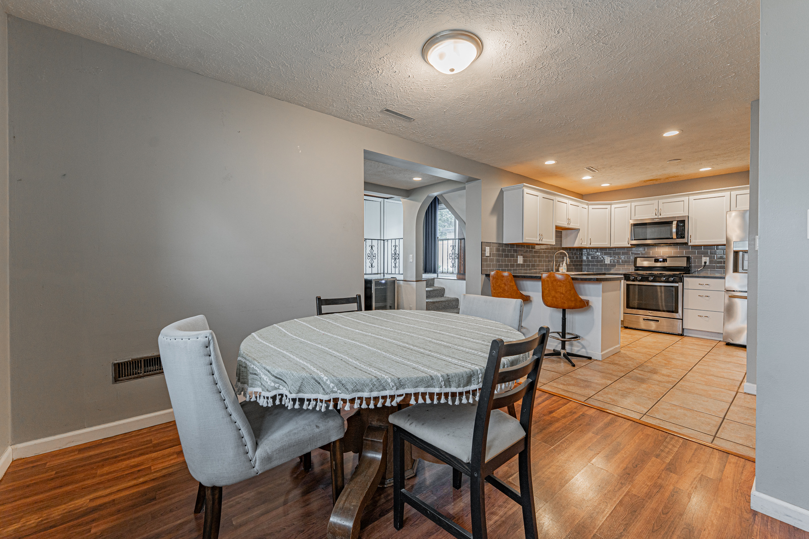 805 South Grove Street Normal, IL 61761 - Photo 10 of 32 a dining room with furniture and wooden floor