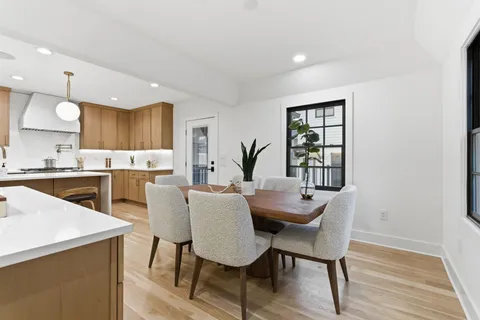 a bedroom with a bed and dresser
