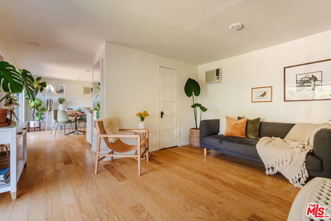 20906 Fontaine Road Topanga, CA 90290 - Photo 20 of 73 a living room with furniture and wooden floor