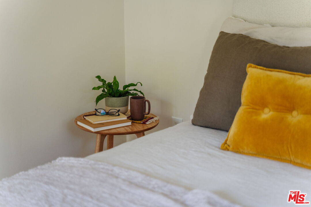 20906 Fontaine Road Topanga, CA 90290 - Photo 29 of 73 a bedroom with a bed and couch