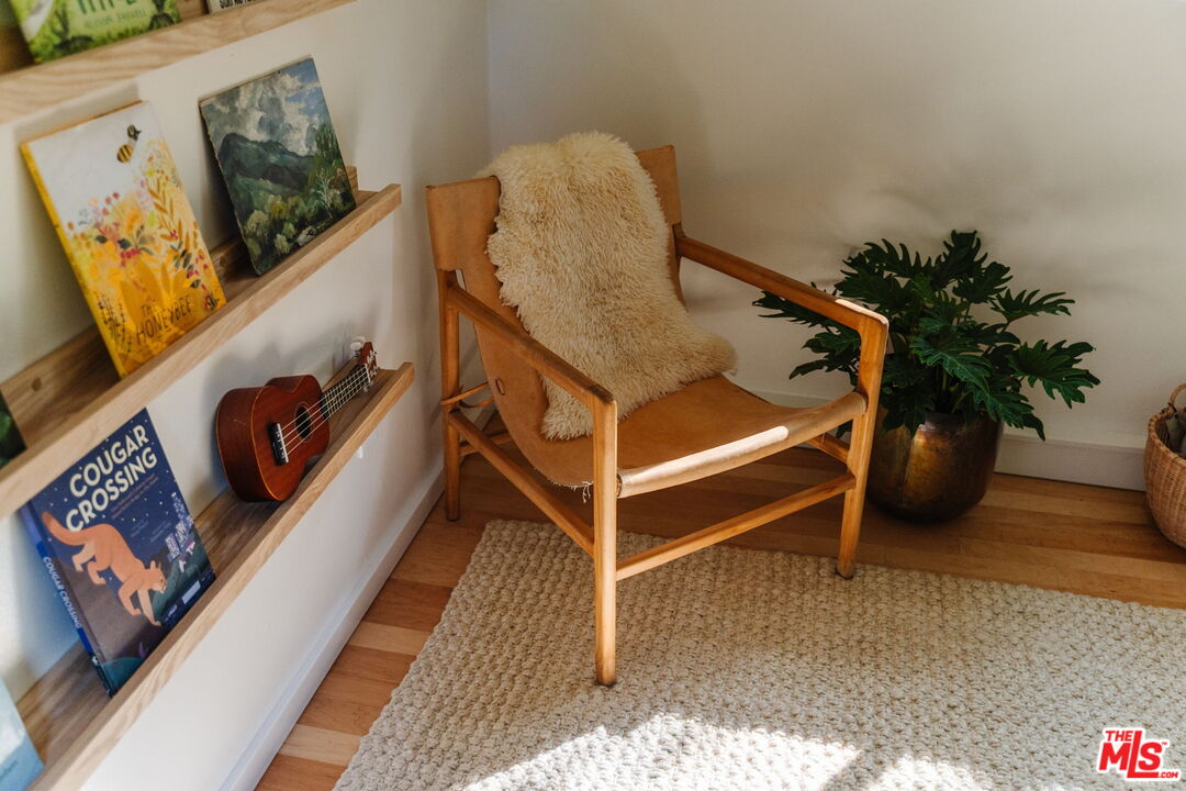 20906 Fontaine Road Topanga, CA 90290 - Photo 43 of 73 a bed room with a bed and a potted plant