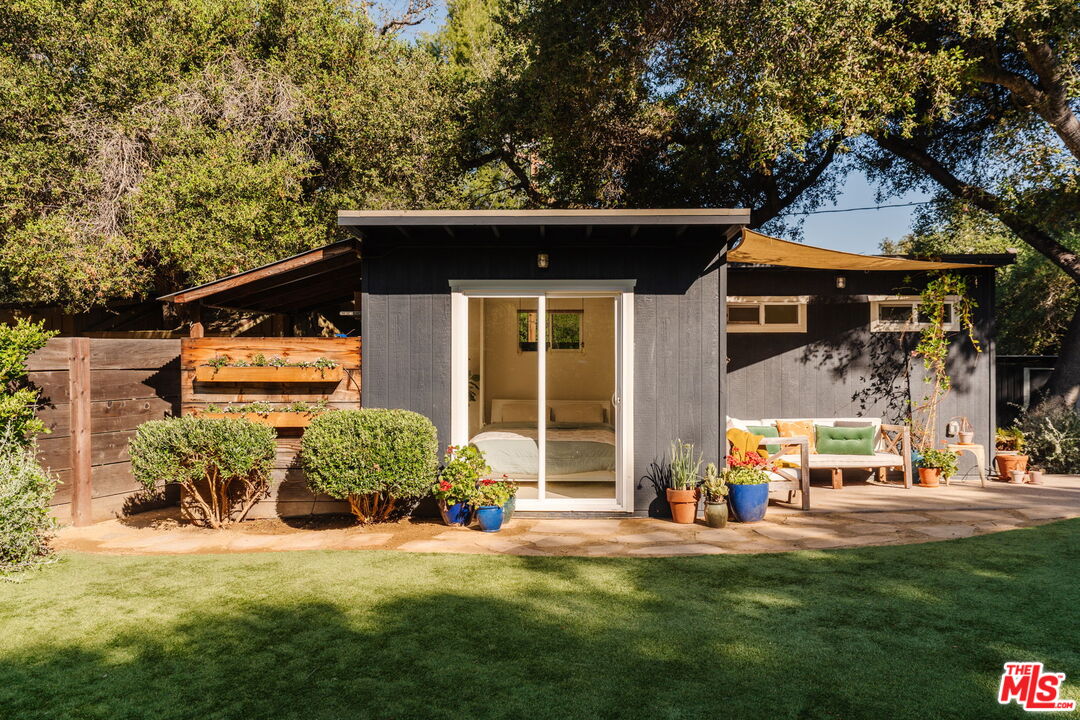 20906 Fontaine Road Topanga, CA 90290 - Photo 52 of 73 a front view of a house with a yard