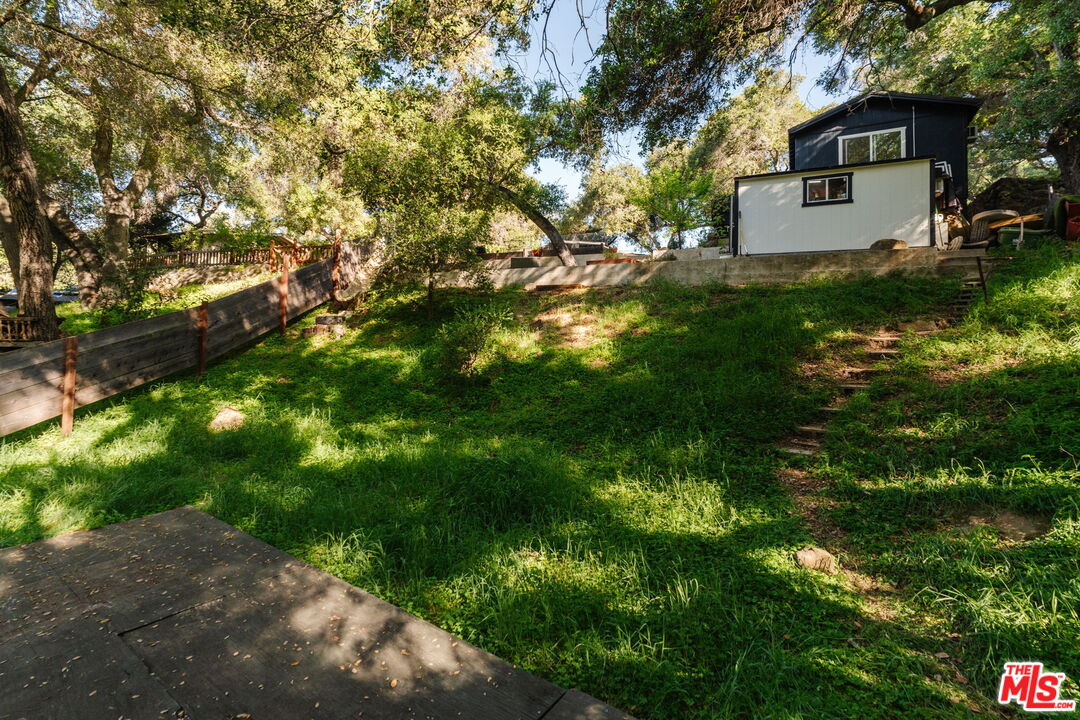 20906 Fontaine Road Topanga, CA 90290 - Photo 63 of 73 a view of a house with a yard