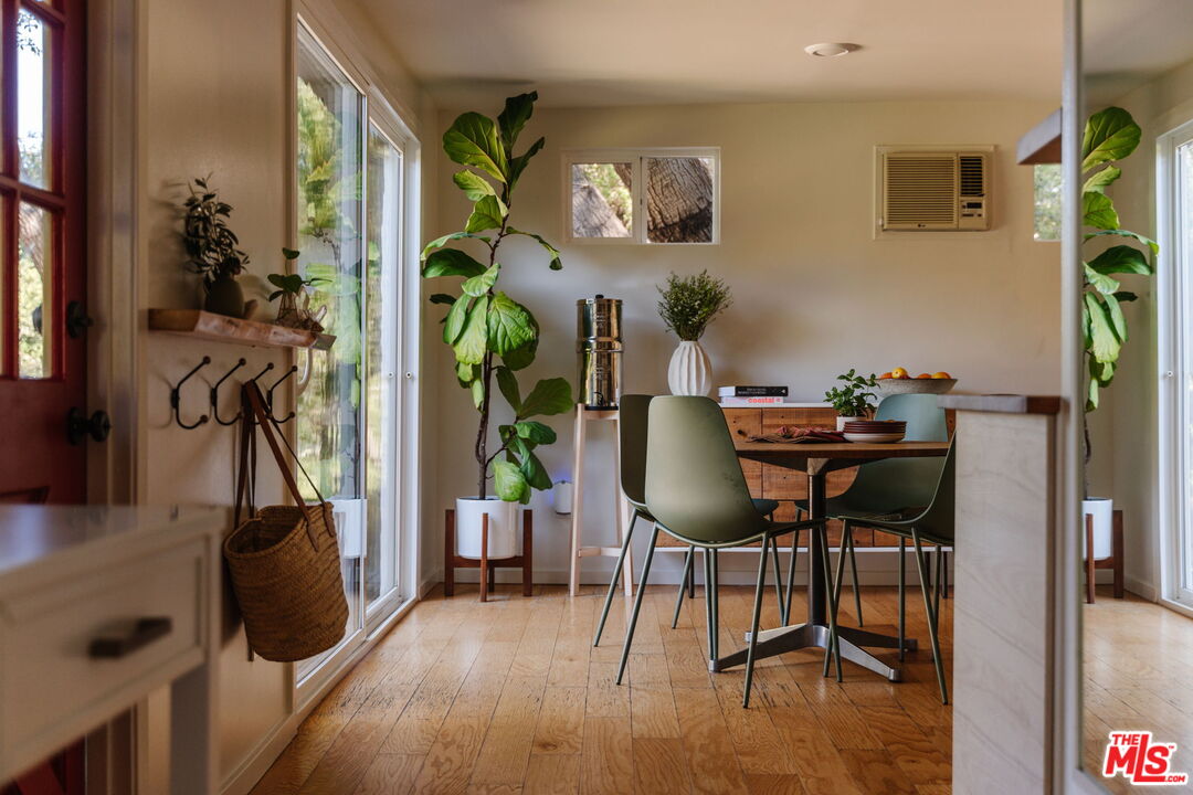 20906 Fontaine Road Topanga, CA 90290 - Photo 10 of 73 a view of a workspace with furniture and wooden floor