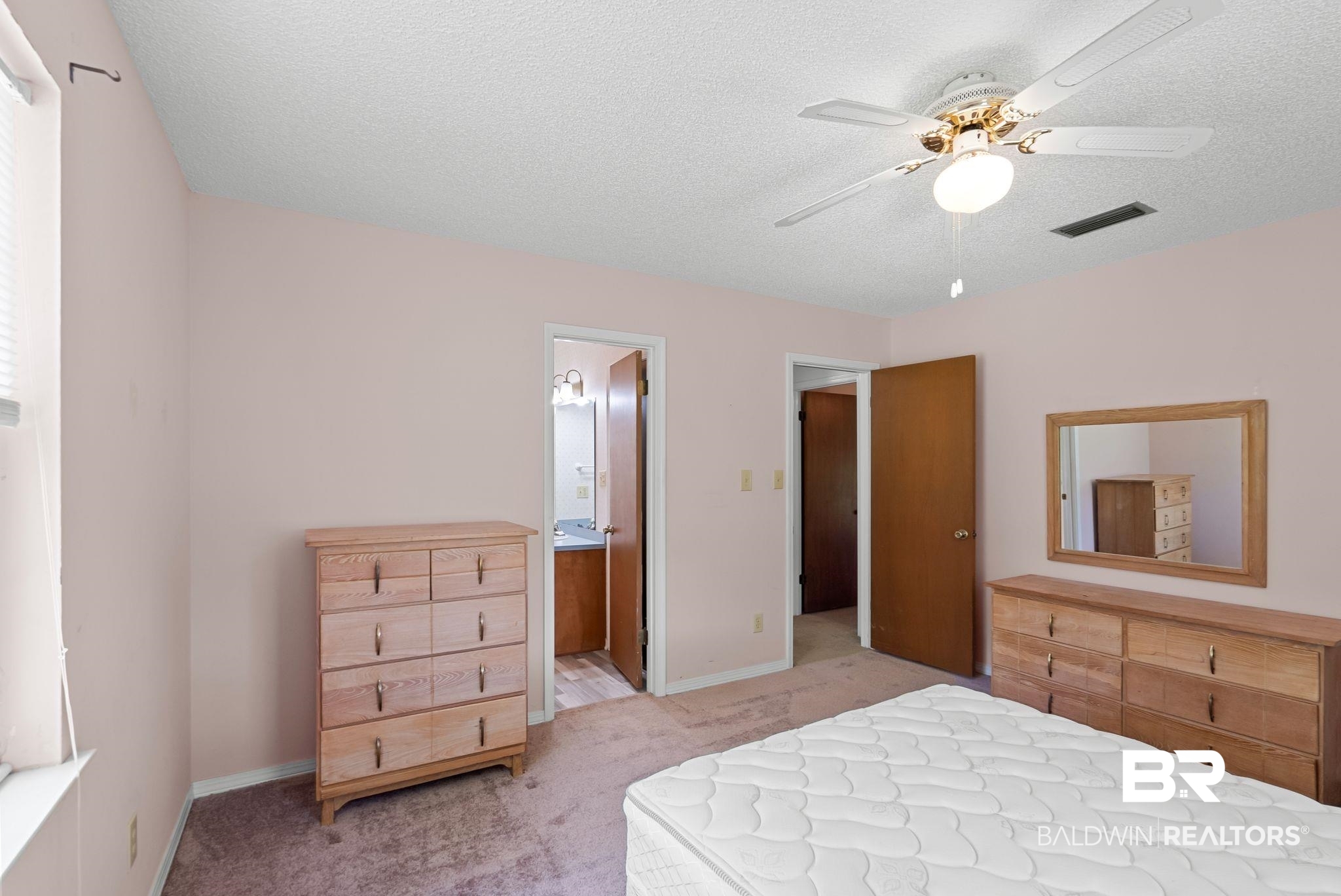 20540 Lacey Road Silverhill, AL 36576 - Photo 14 of 40 Interior room with pink walls and a textured white ceiling