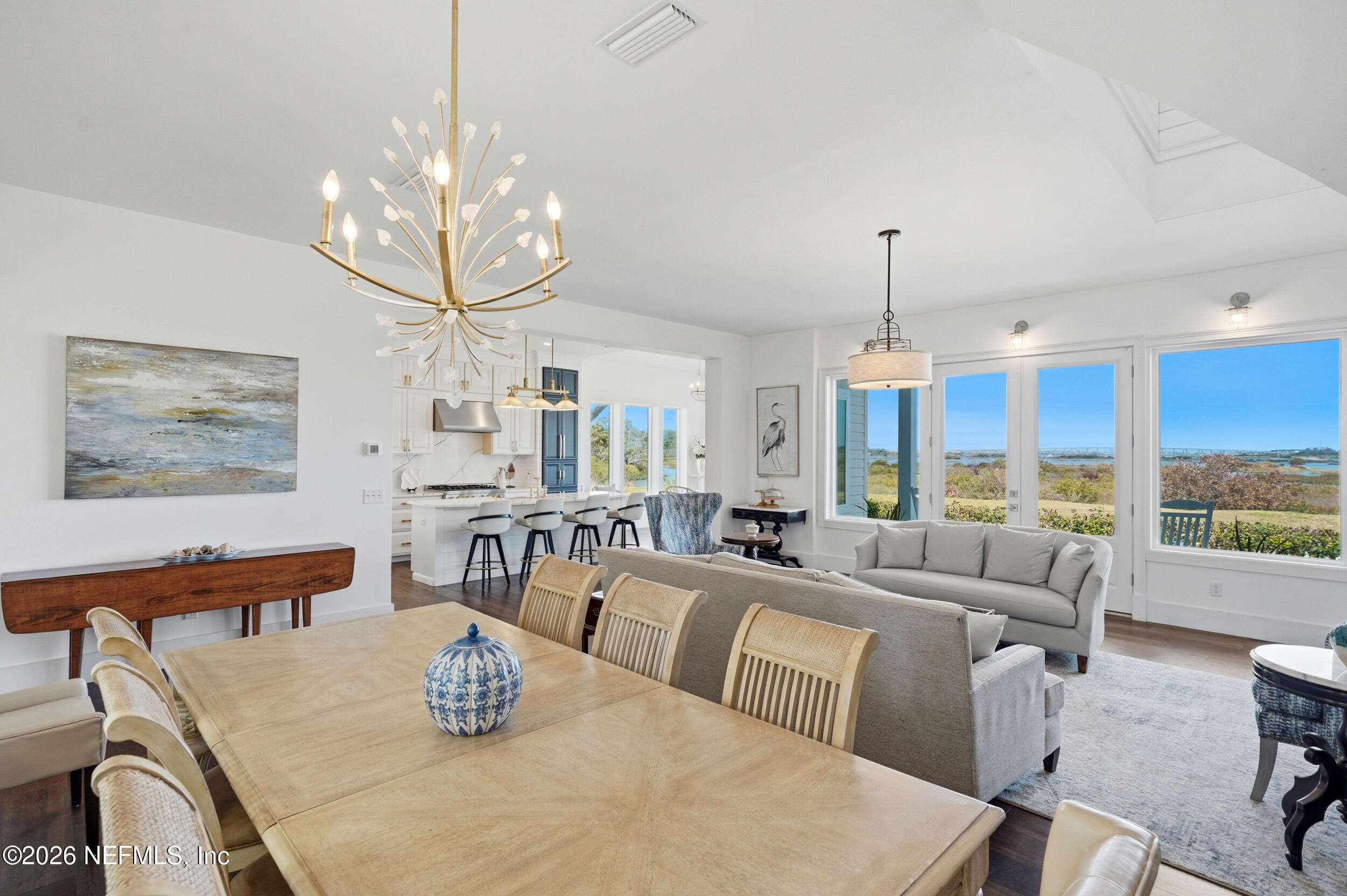 2406 Shore Drive St. Augustine, FL 32086 - Photo 16 of 108 a living room with furniture chandelier and a large window