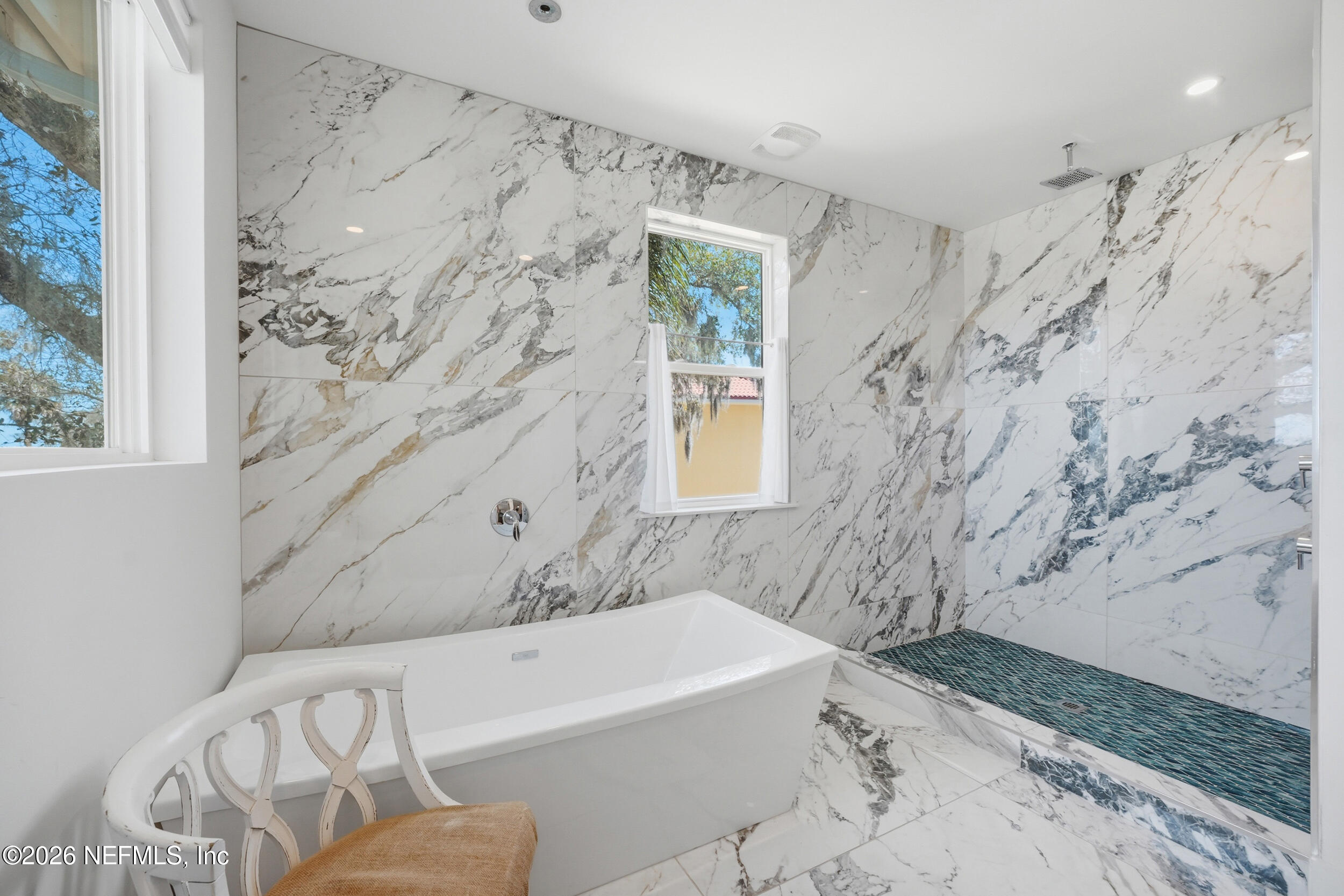 2406 Shore Drive St. Augustine, FL 32086 - Photo 55 of 108 a bathroom with a bathtub and shower
