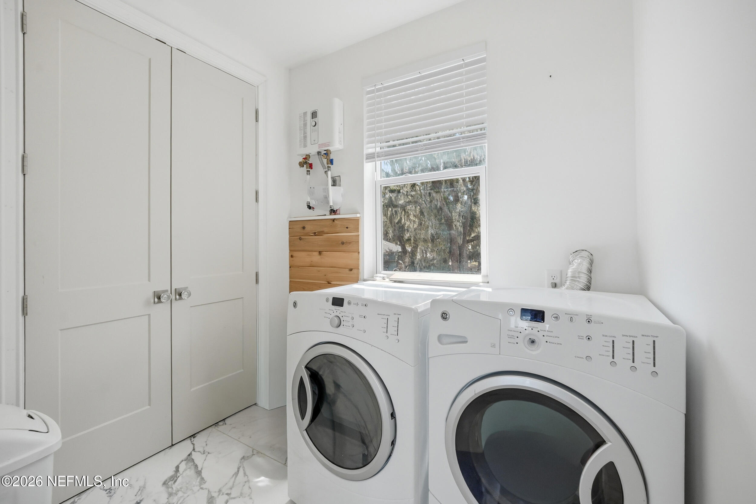 2406 Shore Drive St. Augustine, FL 32086 - Photo 67 of 108 a view of livingroom with washer and dryer