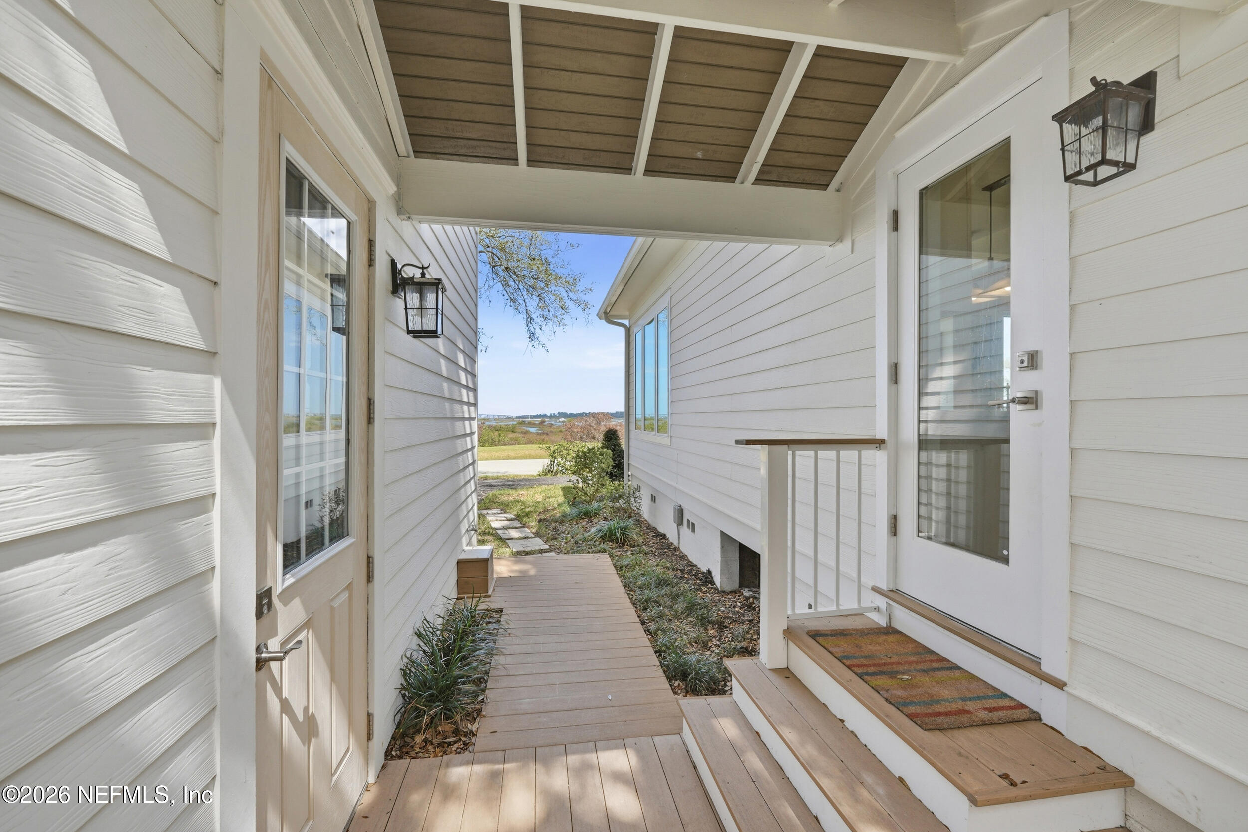 2406 Shore Drive St. Augustine, FL 32086 - Photo 85 of 108 a balcony view with a glass door