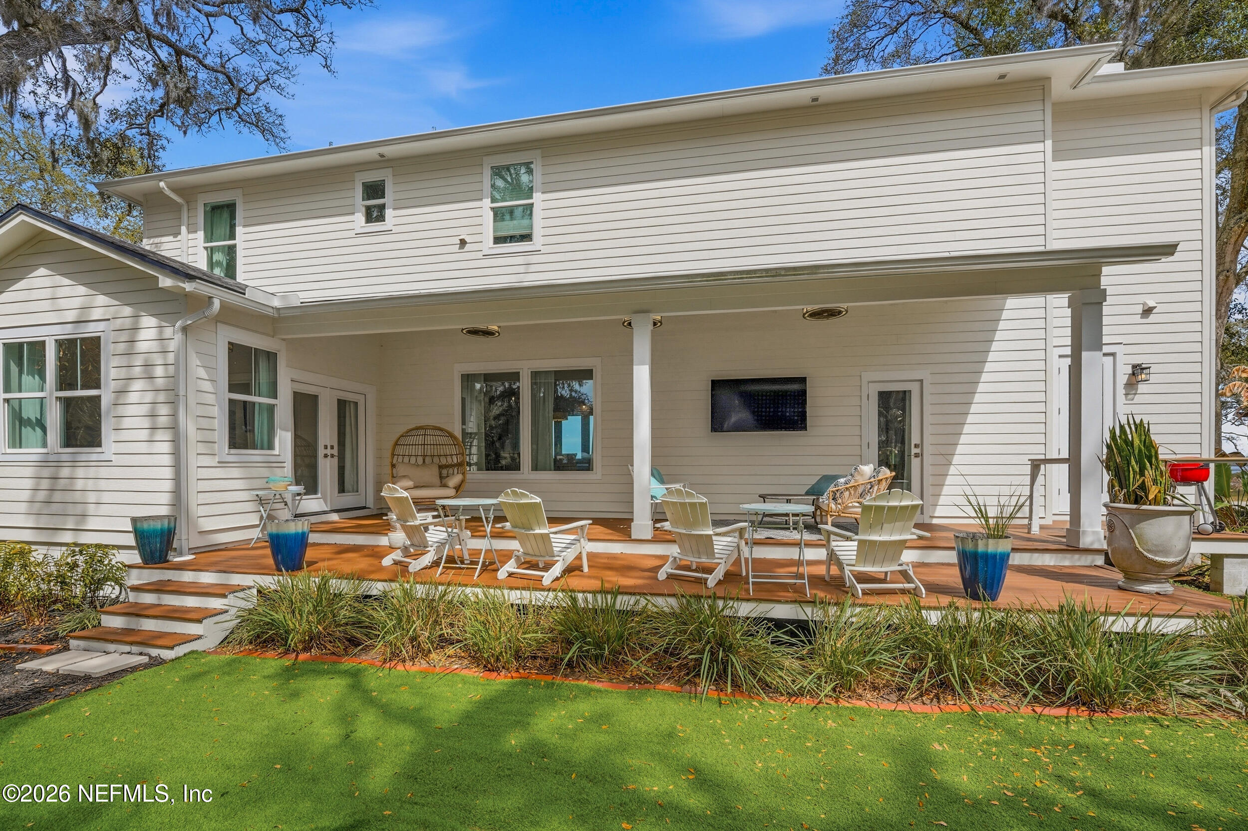 2406 Shore Drive St. Augustine, FL 32086 - Photo 88 of 108 a front view of house with yard and outdoor seating