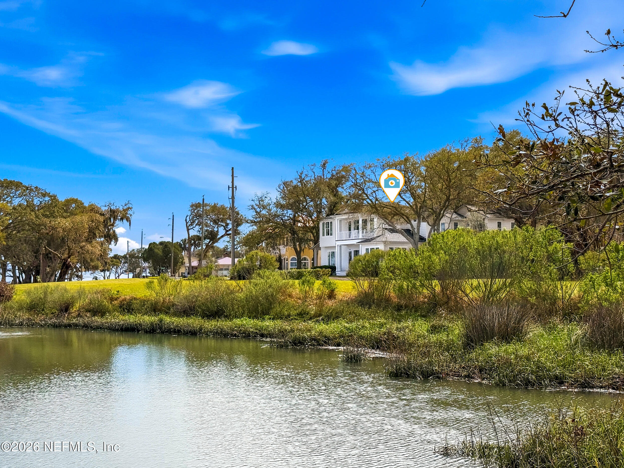 2406 Shore Drive St. Augustine, FL 32086 - Photo 95 of 108 a view of a lake with houses