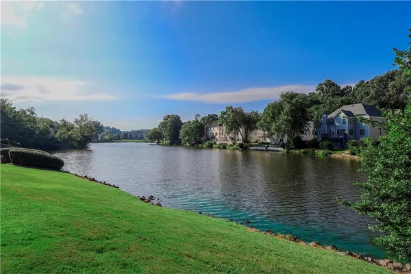 a view of a lake from a yard
