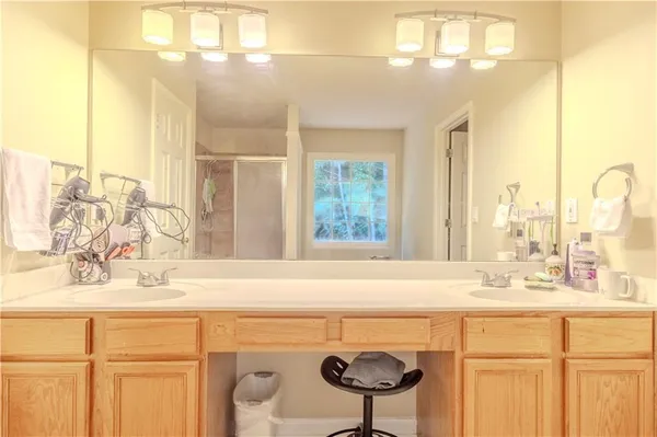 a bathroom with a tub and a shower