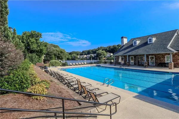 a view of a house with swimming pool