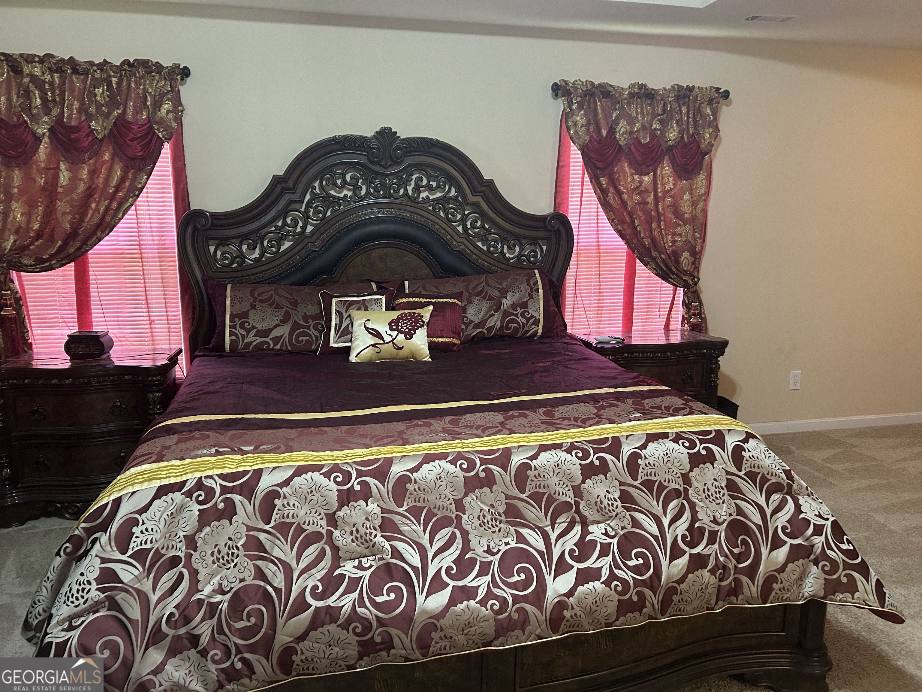 1221 Rhodes Walk Southwest Conyers, GA 30094 - Photo 11 of 19 a bedroom with a bed and dresser