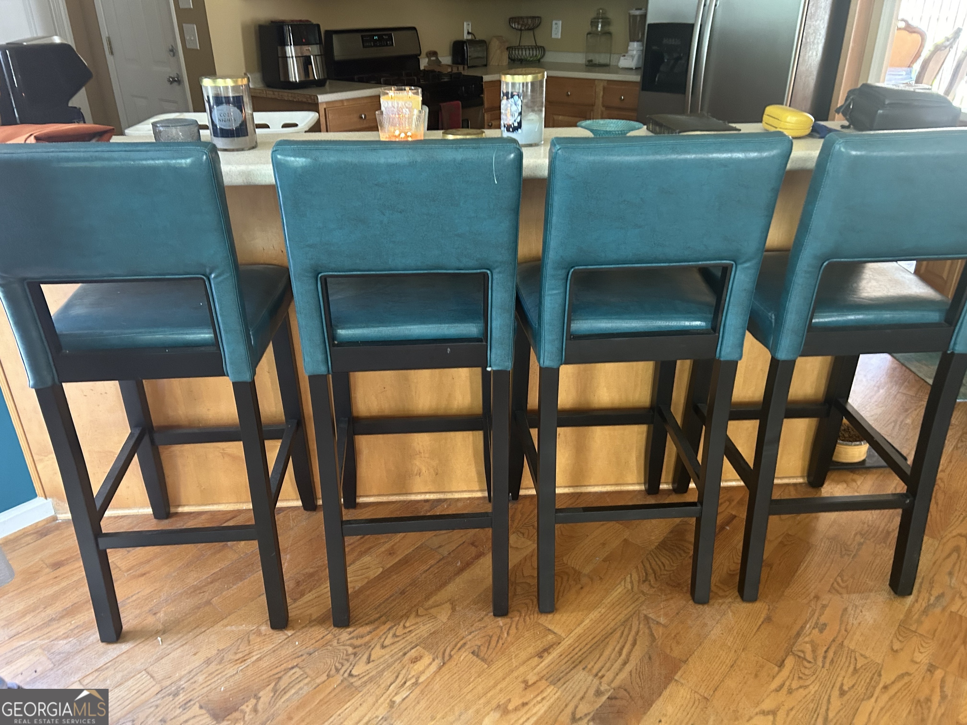 1221 Rhodes Walk Southwest Conyers, GA 30094 - Photo 7 of 19 a dining room with furniture and a window