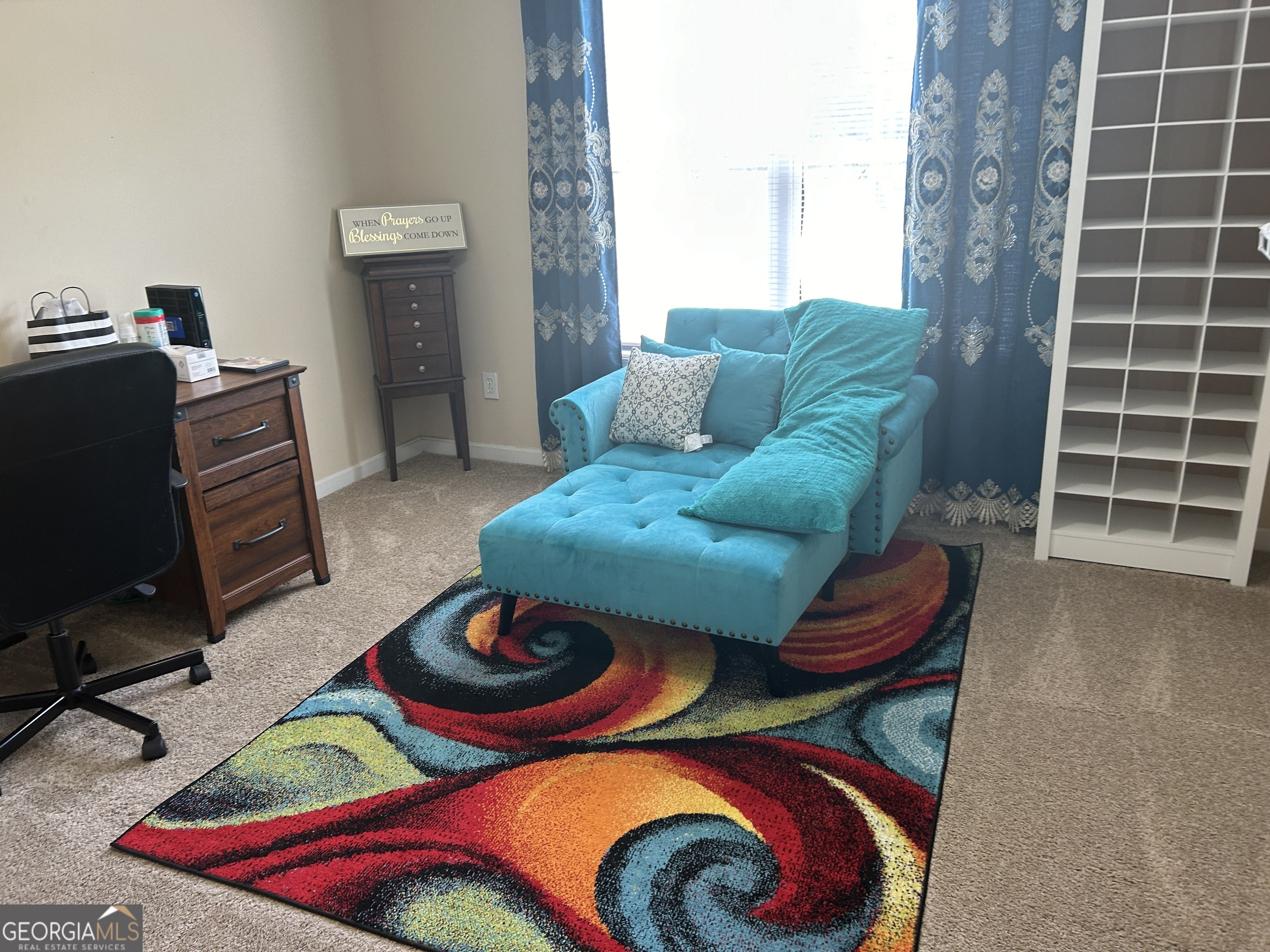 1221 Rhodes Walk Southwest Conyers, GA 30094 - Photo 10 of 19 a living room with furniture and a lamp