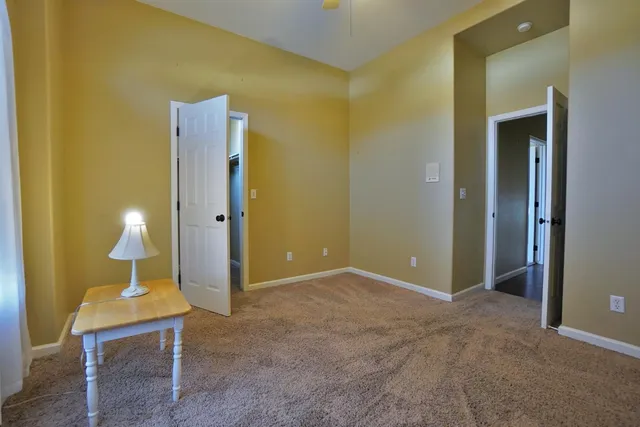 a bathroom with a shower and a door
