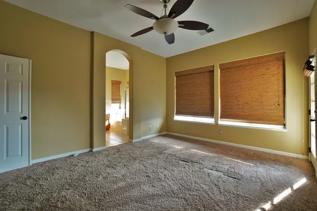 a view of an outdoor dining space with furniture