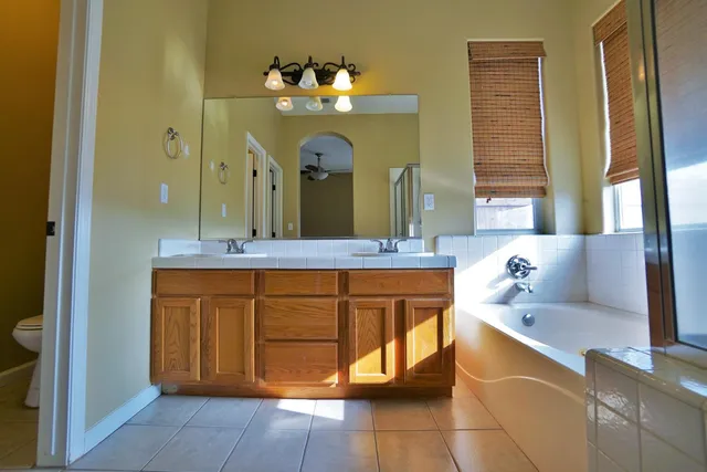 a view of a swimming pool with a patio