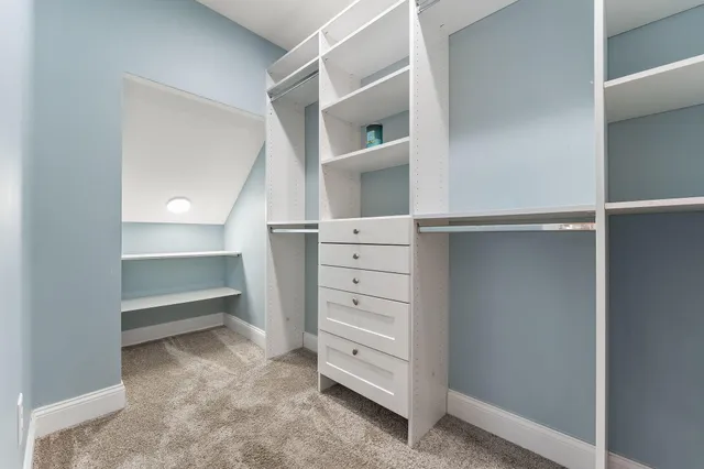 a view of an empty walk in closet