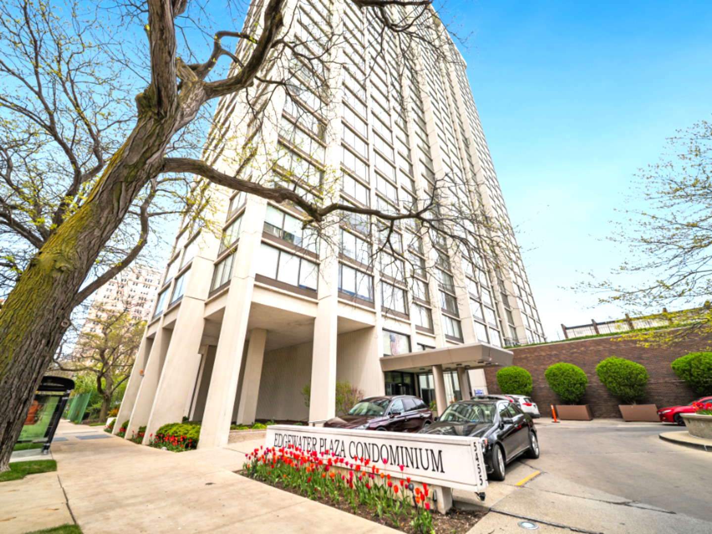 5455 North Sheridan Road, Unit 1404 Chicago, IL 60640 - Photo 1 of 24 a front view of a building