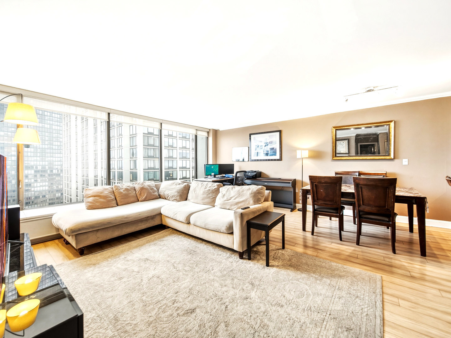 5455 North Sheridan Road, Unit 1404 Chicago, IL 60640 - Photo 10 of 24 a living room with furniture and a large window