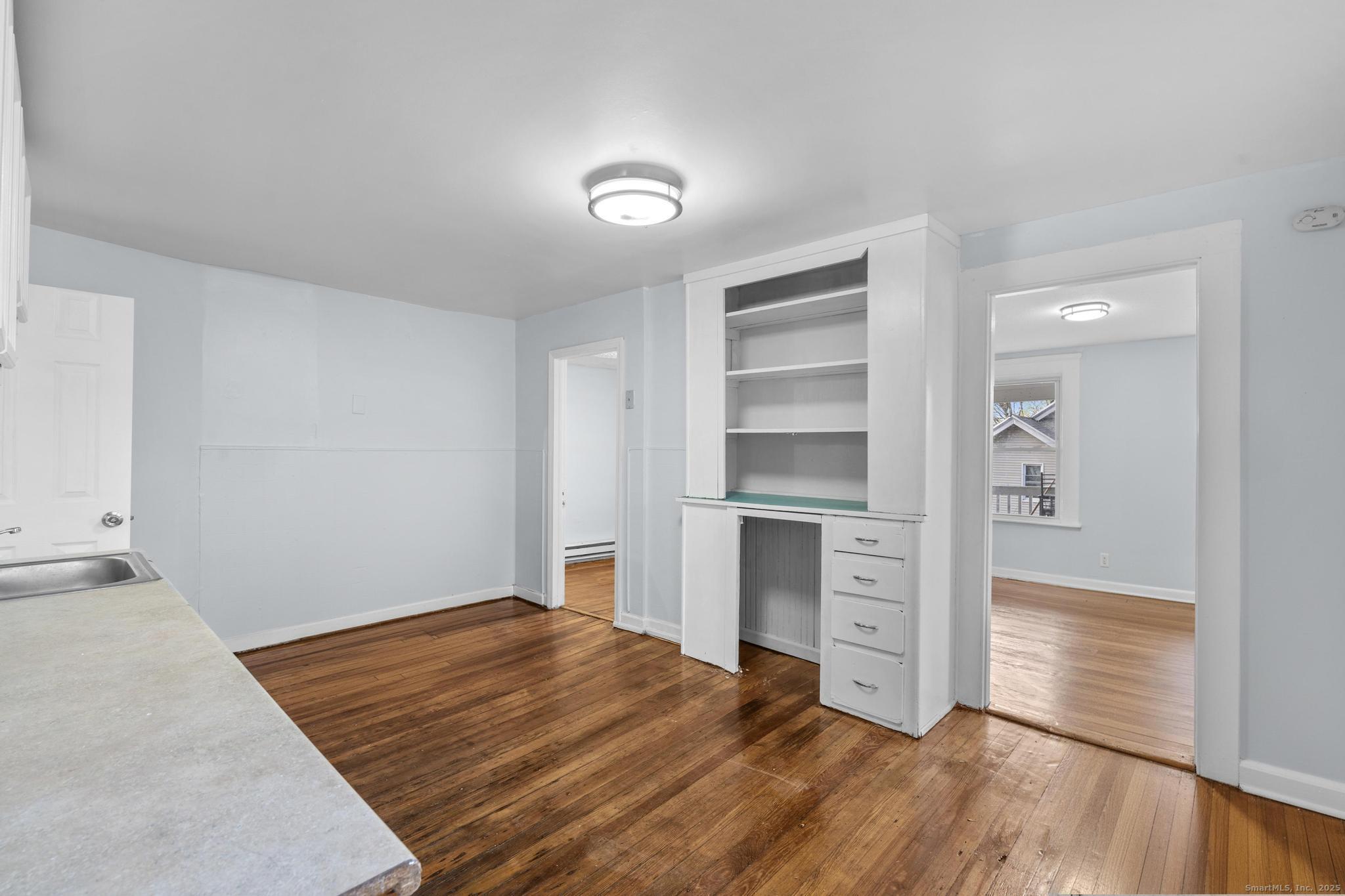 156 Orange Street Waterbury, CT 06704 - Photo 18 of 32 a bedroom with a bed and closet