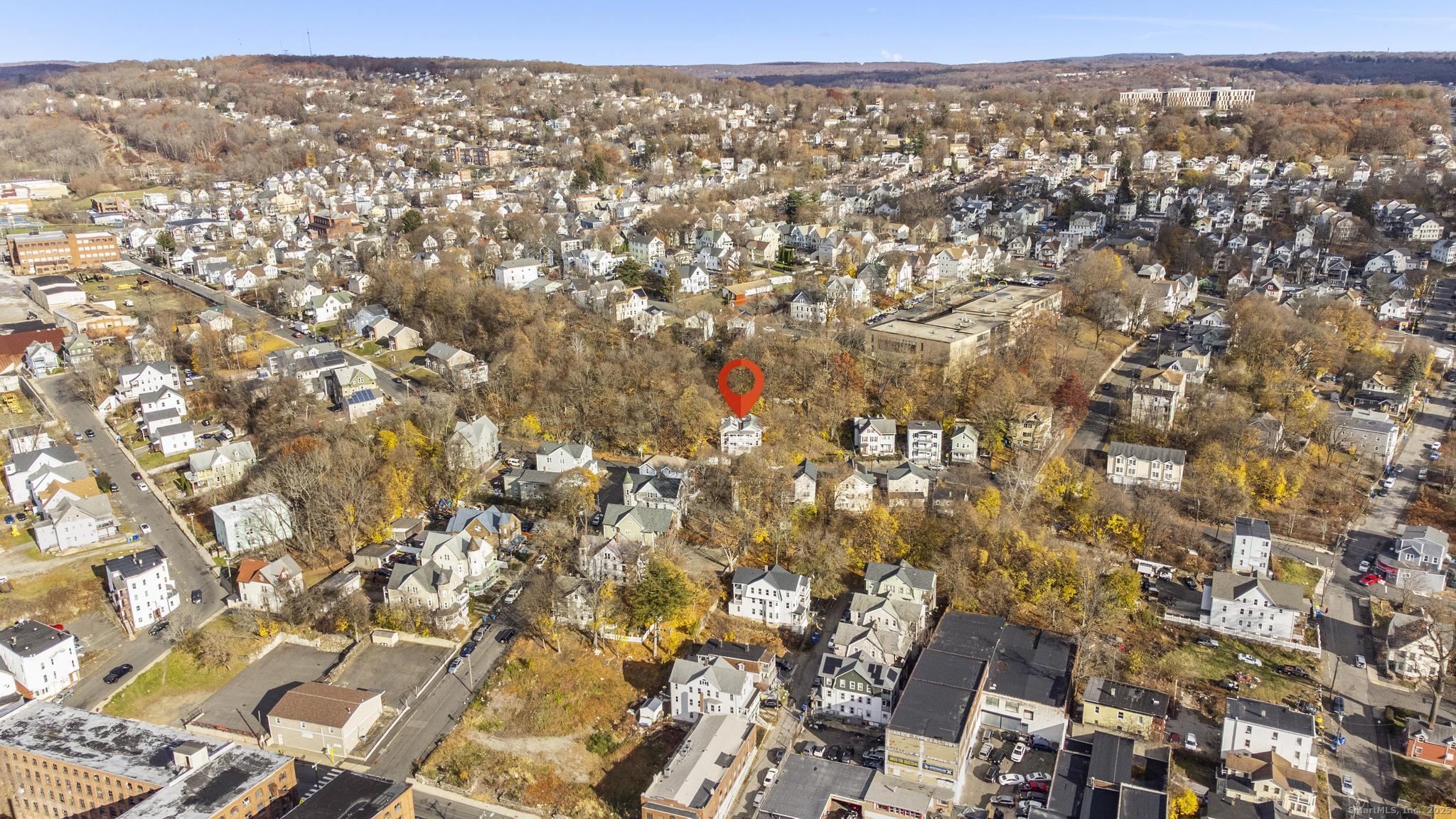 156 Orange Street Waterbury, CT 06704 - Photo 27 of 32 an aerial view of residential houses with city view