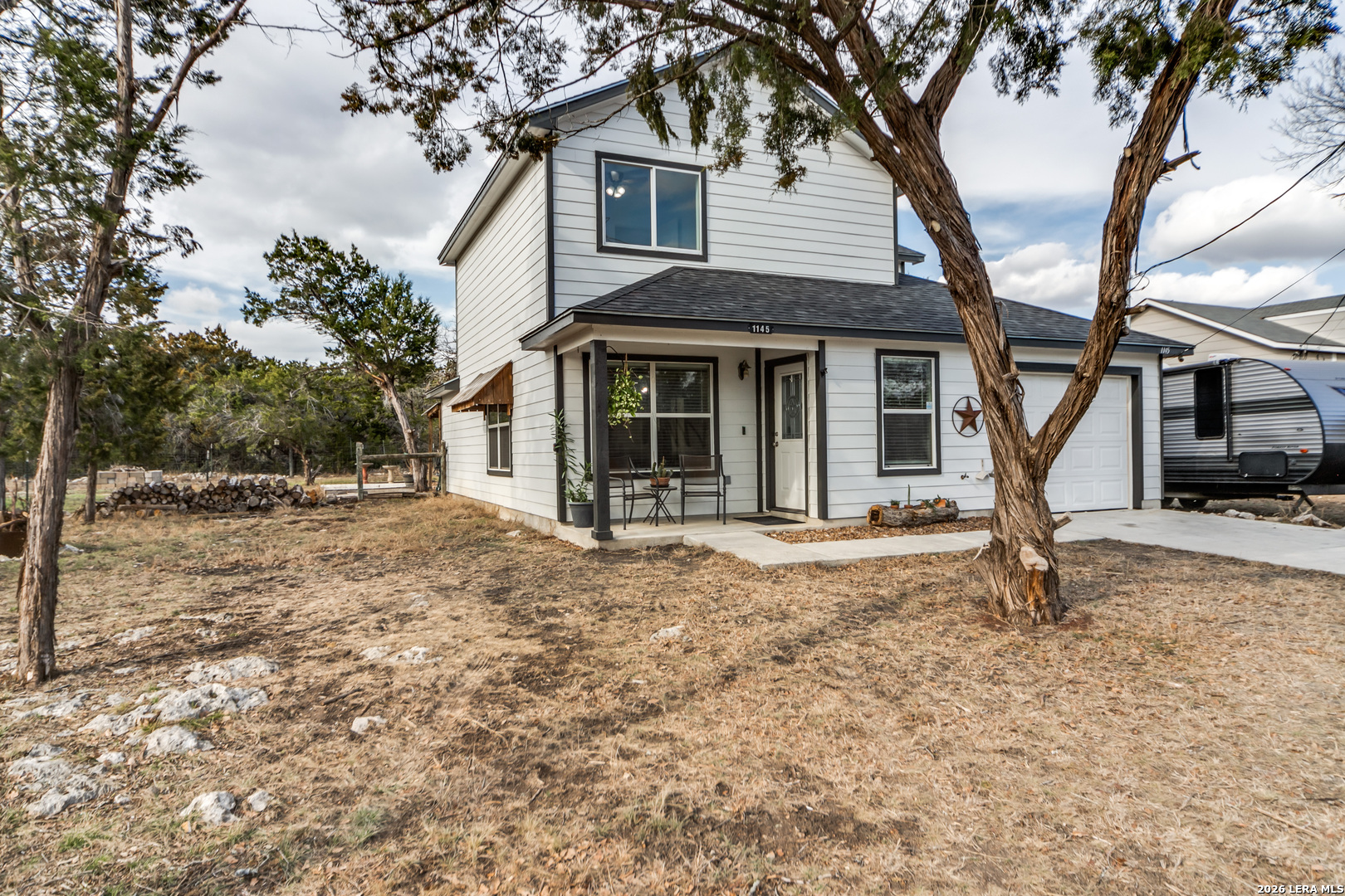 a house with trees in front of it