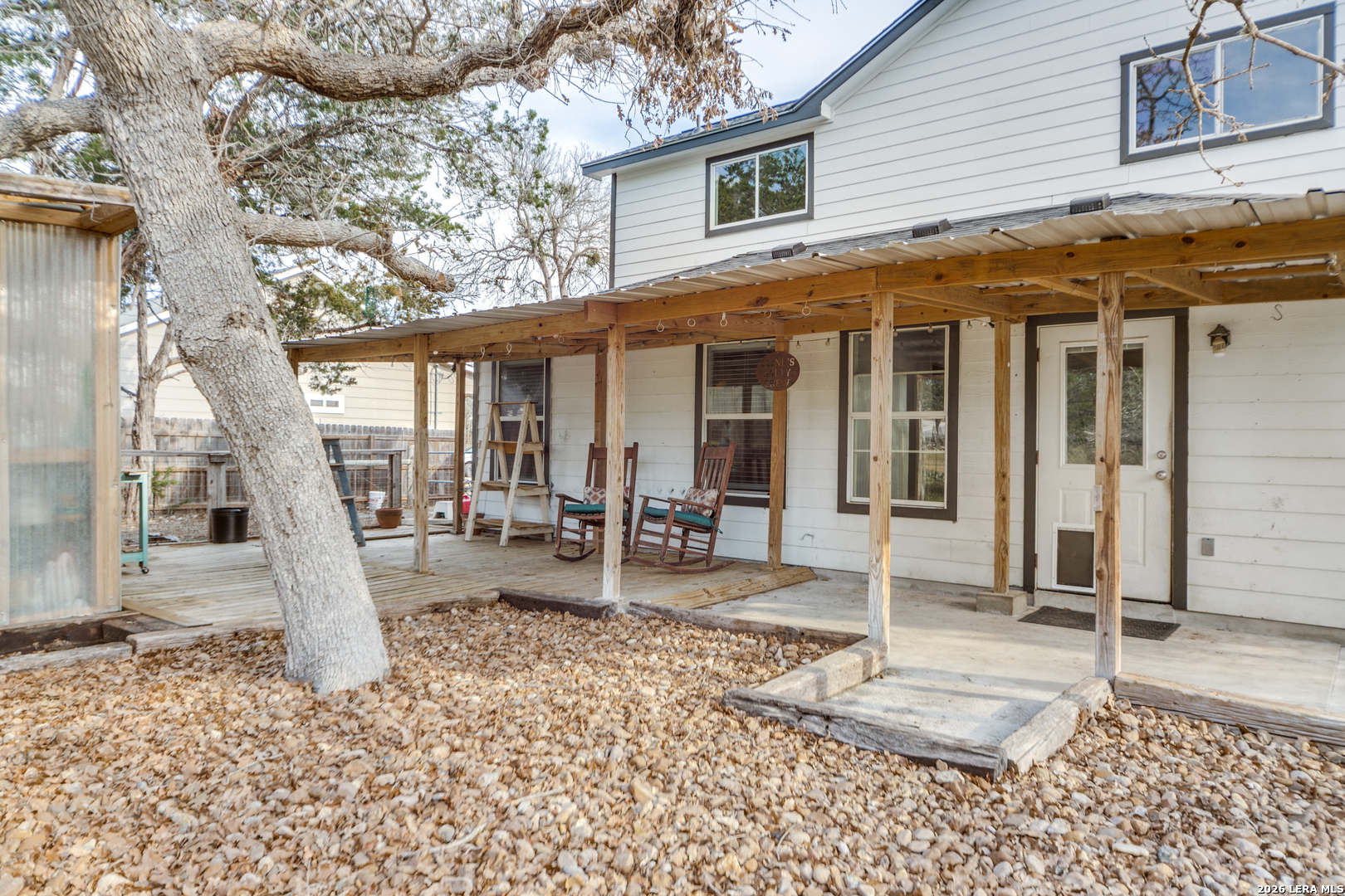 1145 Bob White Drive Spring Branch, TX 78070 - Photo 20 of 27 a backyard of a house with seating space