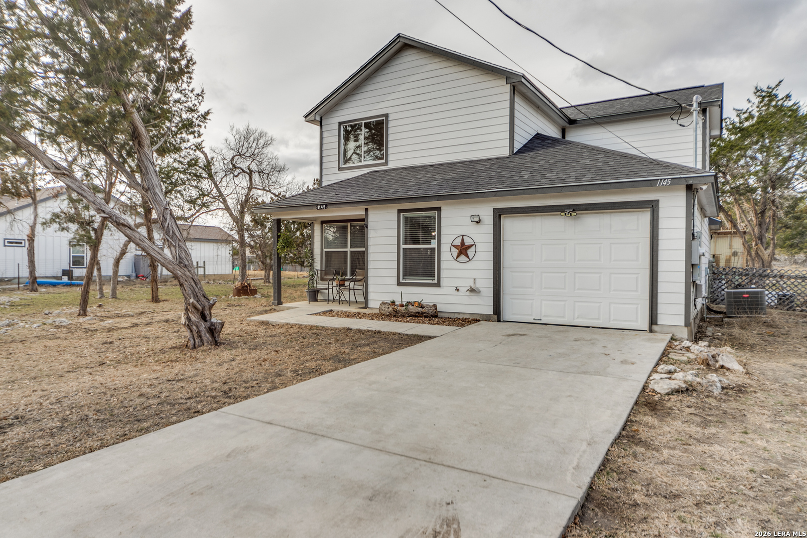 1145 Bob White Drive Spring Branch, TX 78070 - Photo 2 of 27 a house view with a outdoor space