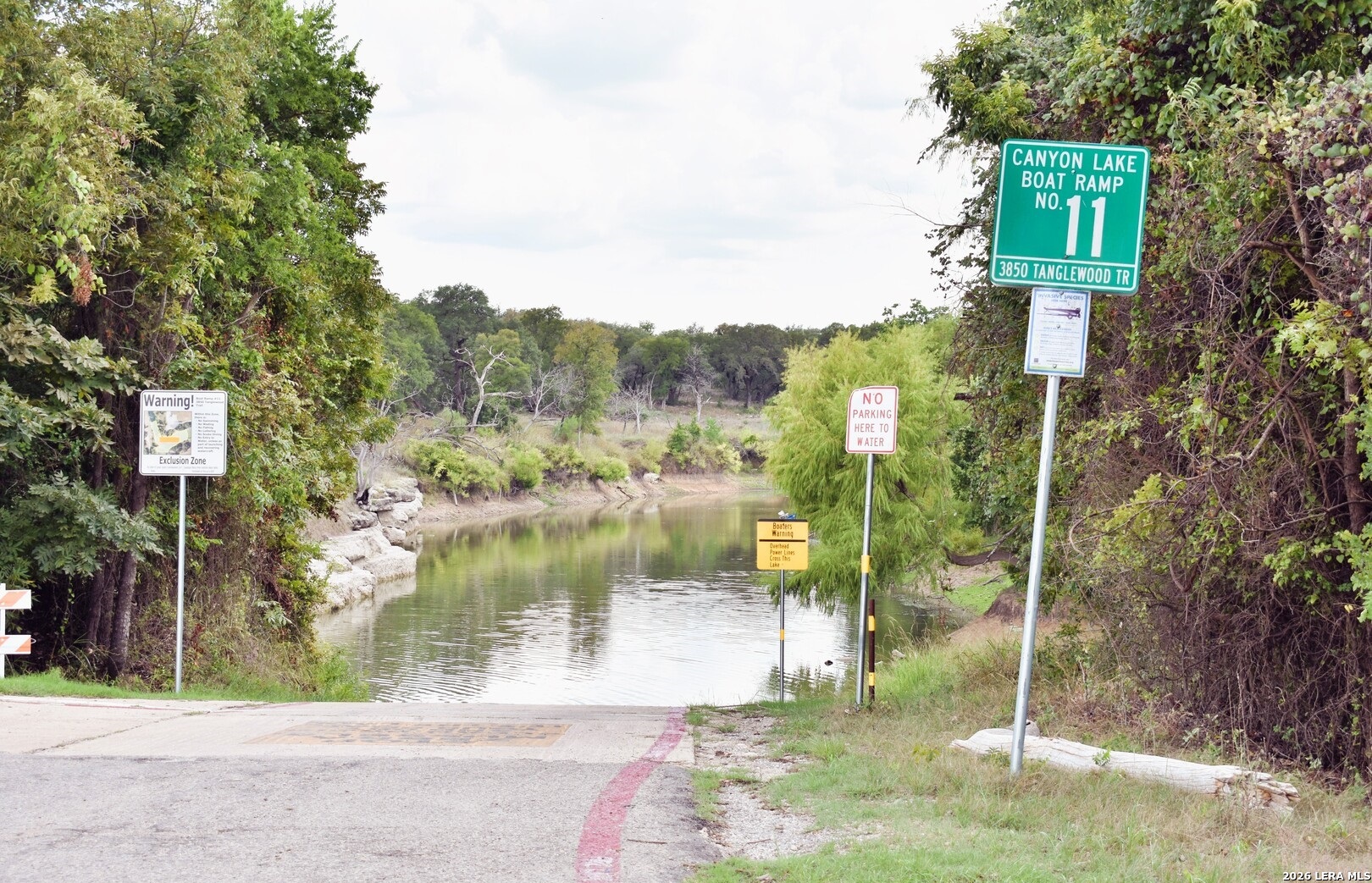 1145 Bob White Drive Spring Branch, TX 78070 - Photo 25 of 27 a lake view with a house
