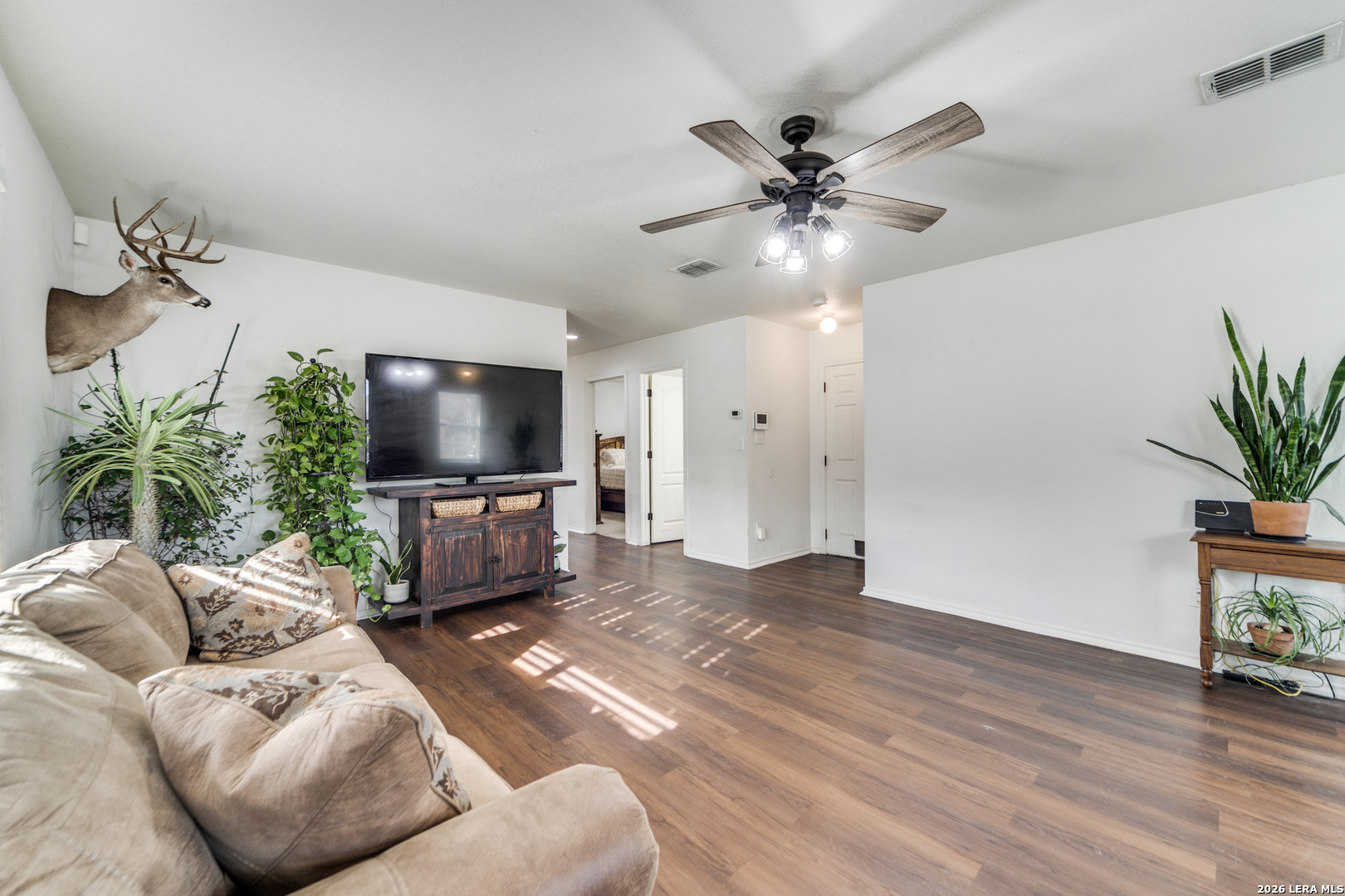 1145 Bob White Drive Spring Branch, TX 78070 - Photo 9 of 27 a living room with furniture and a flat screen tv