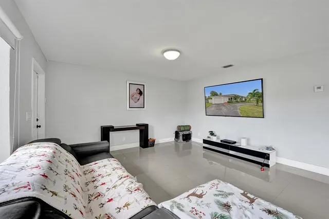 a bedroom with bed and a window