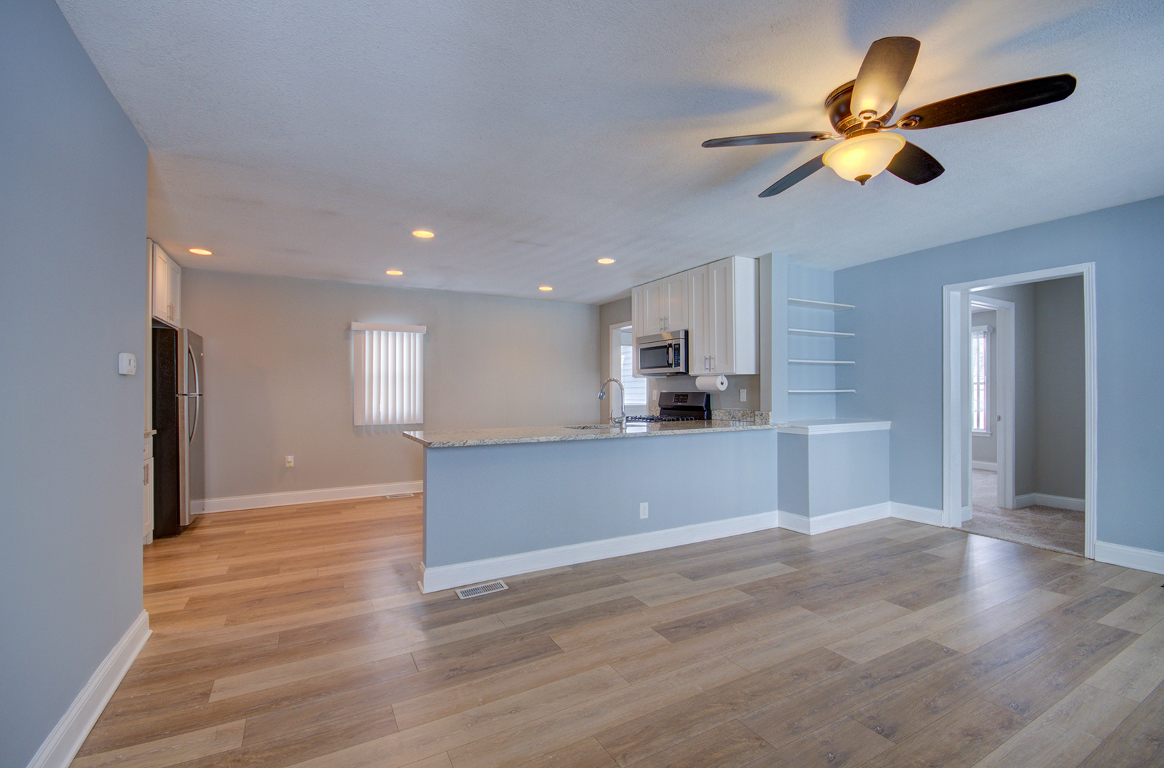 1168 South 5000W Road Kankakee, IL 60901 - Photo 5 of 30 a view of empty room with wooden floor and window