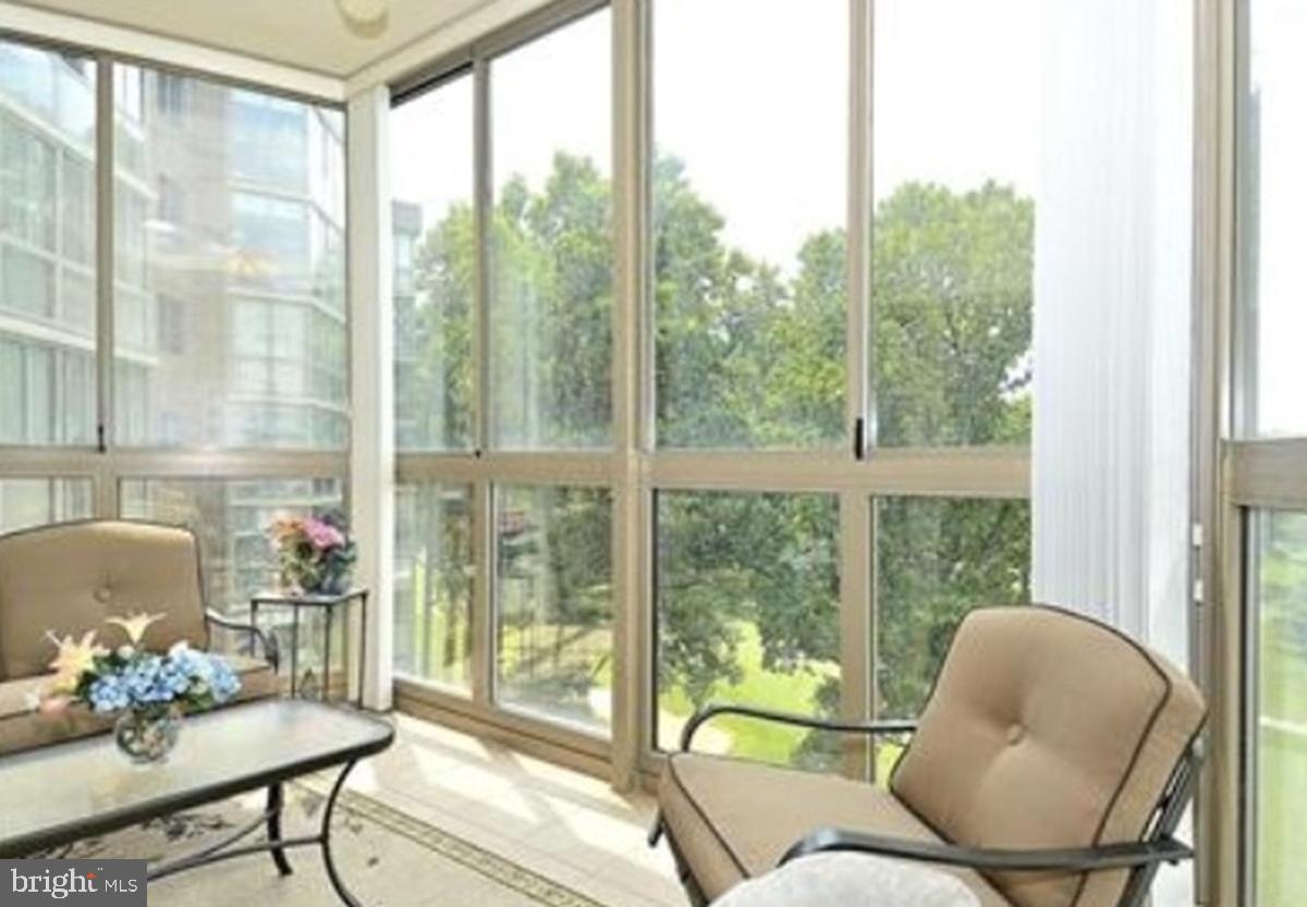3005 South Leisure World Boulevard, Unit 514 Silver Spring, MD 20906 - Photo 5 of 16 Sun Room