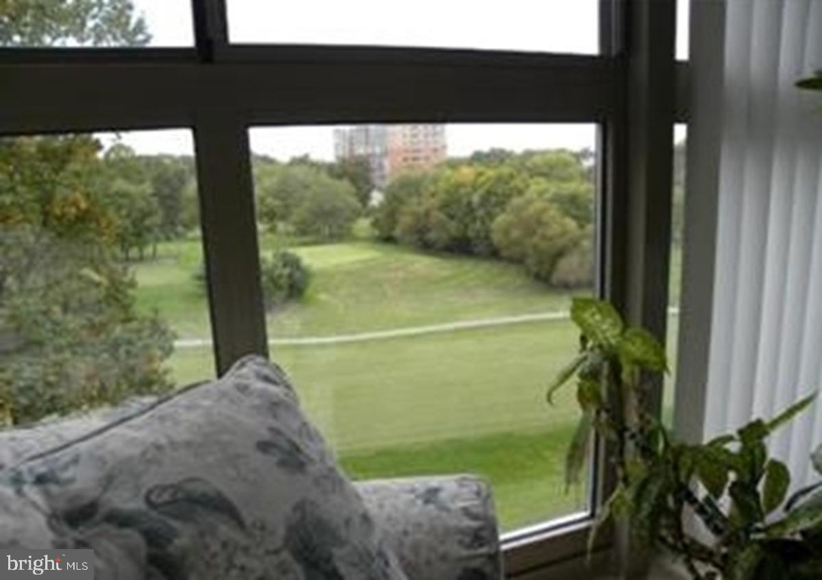 3005 South Leisure World Boulevard, Unit 514 Silver Spring, MD 20906 - Photo 6 of 16 Sun Room