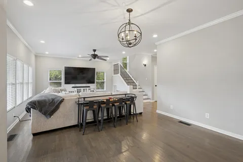 a view of livingroom with furniture flat screen tv