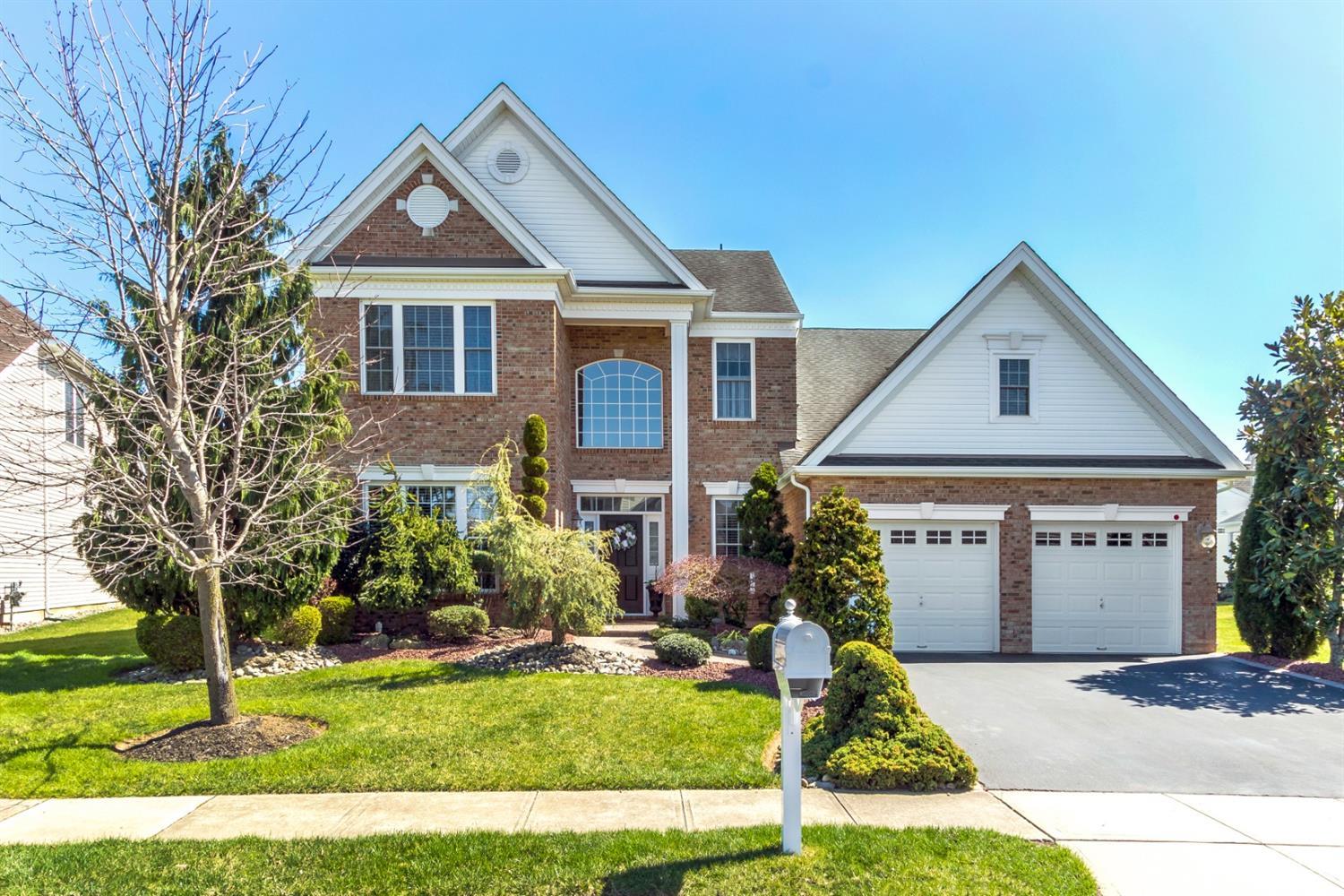 28 Kings Mill Road Monroe Township, NJ 08831 - Photo 1 of 42 a front view of a house with a yard